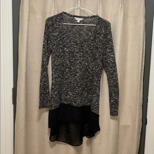 Black high low sweater with ruffle